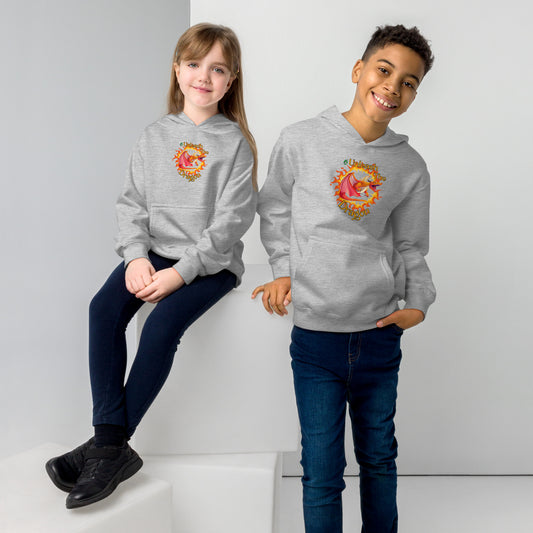 A boy standing and a girl sitting both wearing a grey kids graphic hoodie with a red dragon breathing fire and the statement unleash the dragon, by Wizard Prints