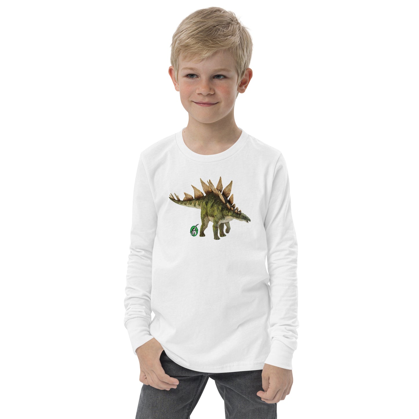 A boy standing and wearing a white long-sleeve T-shirt featuring a printed graphic of life like Stegosaurus, by Wizard Prints.