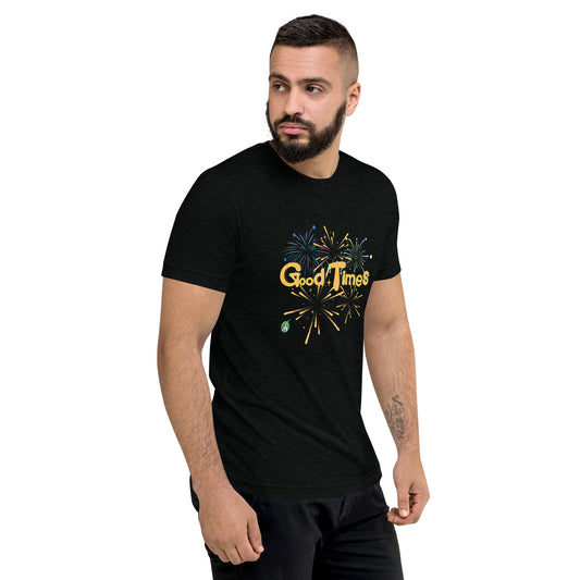 A man standing wearing a black tee shirt with a printed graphic of the sun and the words, Good Vibes. Designed by Wizard Prints