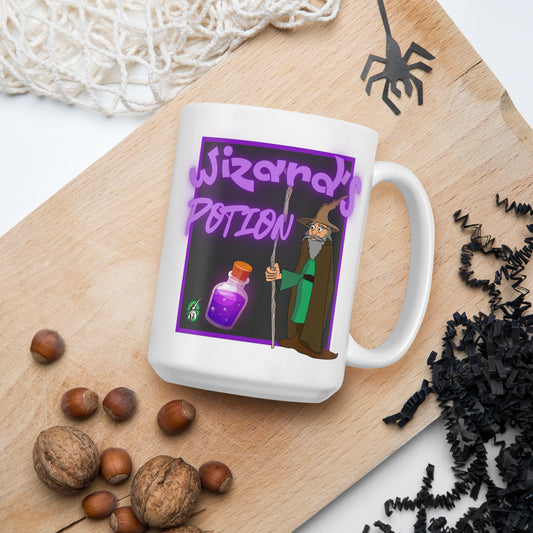 White Wizard Prints mug with cartoon wizard and 'Wizard's Potion' text on a wooden board with nuts and spider decorations.