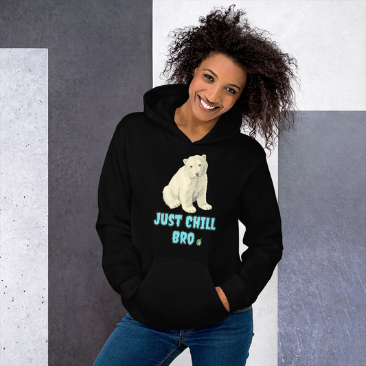 A woman standing wearing a black hoodie with a printed graphic of a bear with the words, 'Just Chill Bro'. Designed by Wizard Prints.