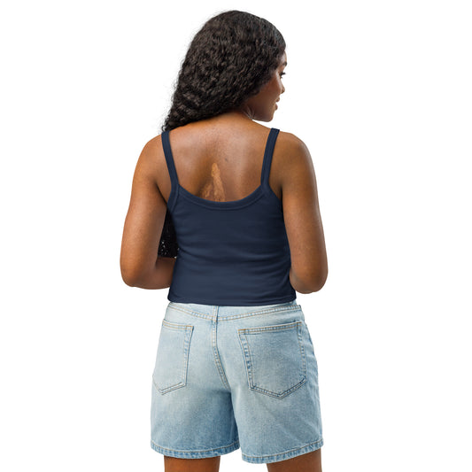 A woman standing with her back turned wearing a navy tank top. Design by Wizard Prints.