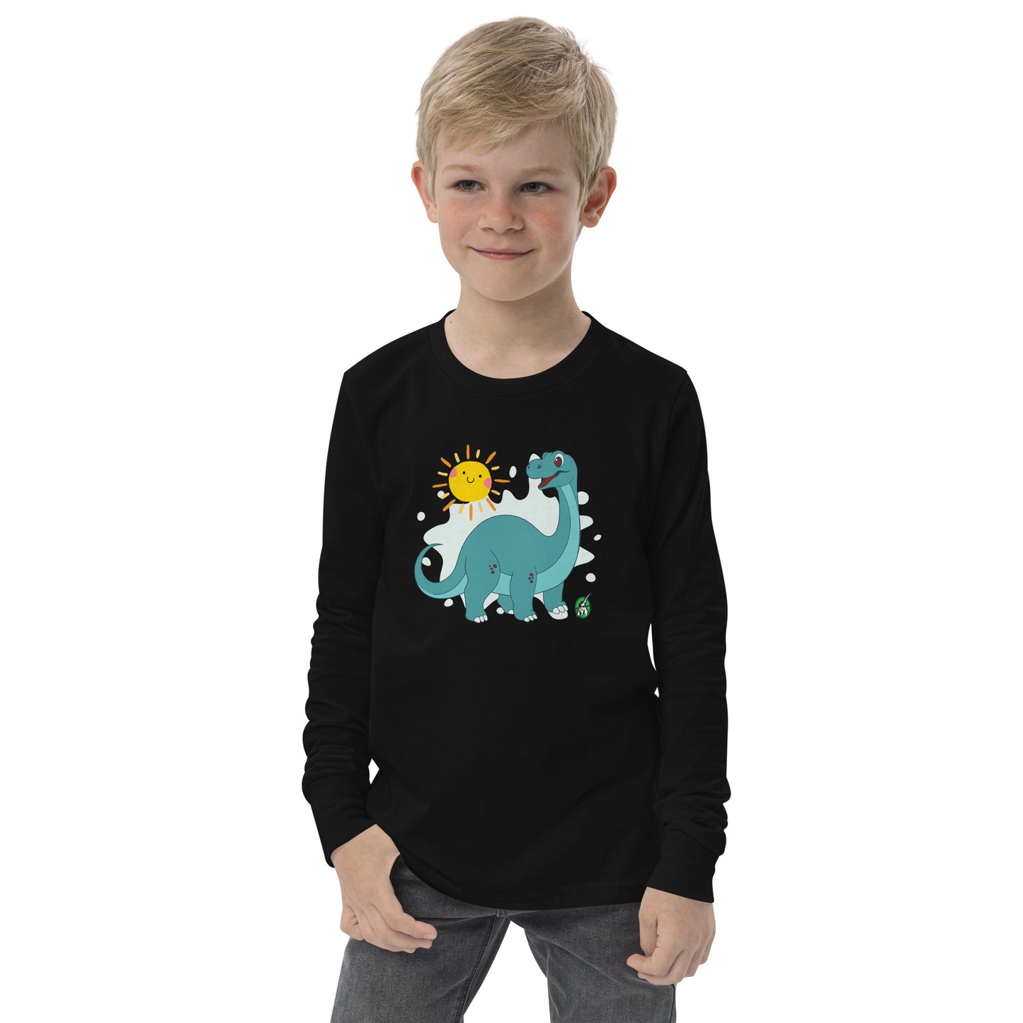 A boy standing and wearing a black long sleeve t-shirt with a printed graphic of a smiling brachiosaurus and the sun. Designed by Wizard Prints