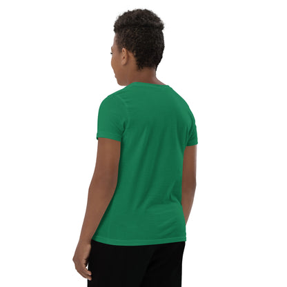 A boy standing to show the back of a Wizard Prints green kids graphic t-shirt