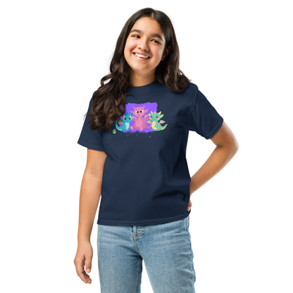 A girl standing and wearing a navy blue t-shirt featuring a printed graphic of colorful dragons, designed by Wizard Prints.
