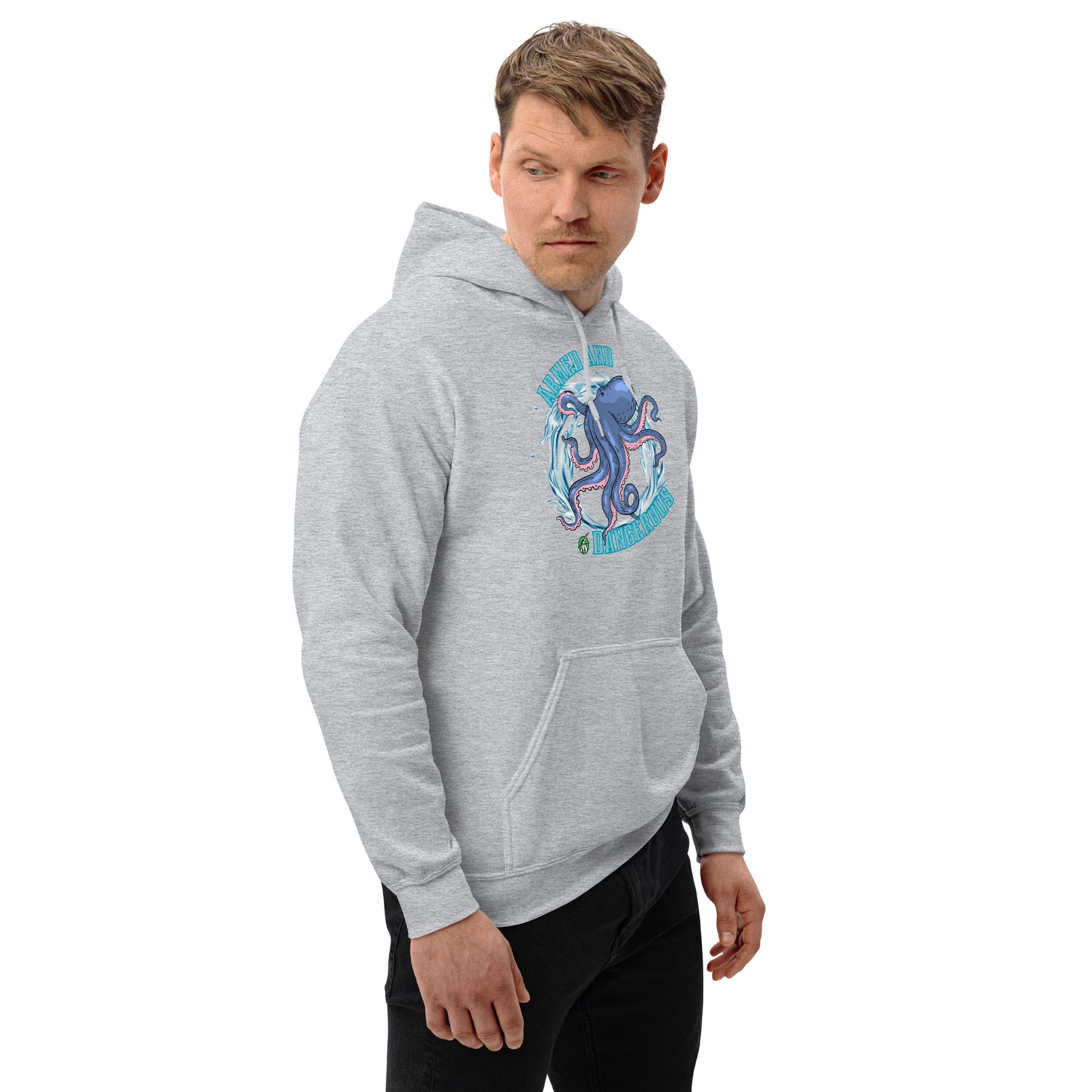 A man standing and wearing a grey hoodie with a printed graphic of an octopus with the words, Armed and Dangerous. Designed by Wizard Prints.