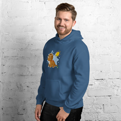 A man standing wearing an indigo hoodie with a printed graphic of a smiling cartoon dinosaur and the sun. Designed by Wizard Prints