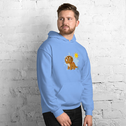 A man standing wearing a light blue hoodie with a printed graphic of a smiling cartoon dinosaur and the sun. Designed by Wizard Prints