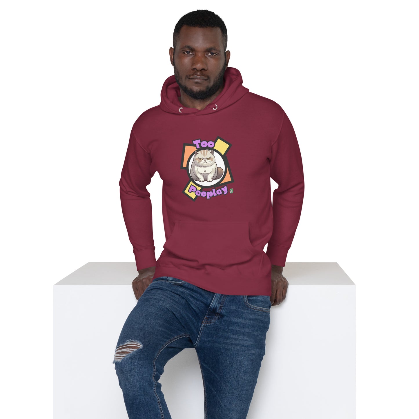 A man standing wearing a maroon hoodie with a printed graphic of a grumpy cat with the words, 'Too Peopley'. Designed by Wizard Prints