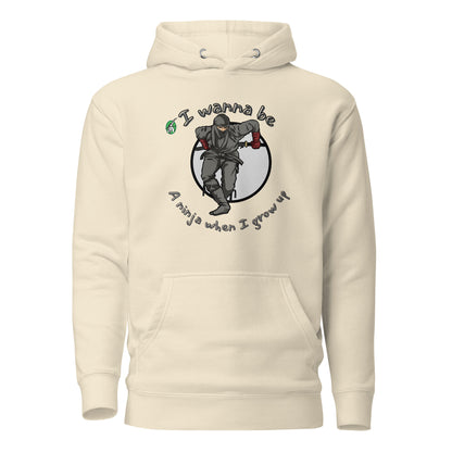 Women's beige hoodie with a printed graphic of a ninja with the words, I wanna be a ninja when I grow up. Designed by Wizard Prints