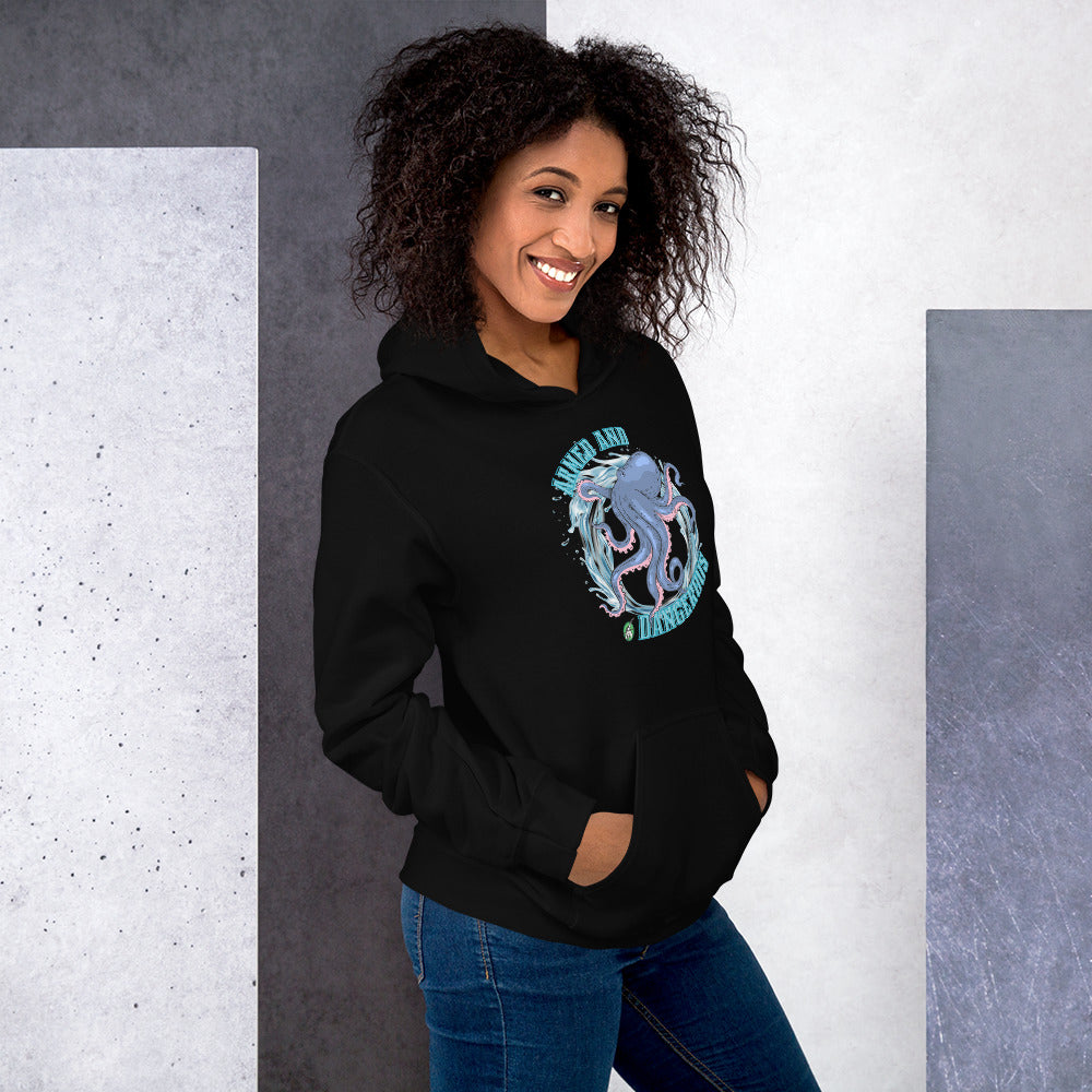 A women standing and wearing a black hoodie with the graphic of an octopus and the text, Armed and Dangerous by Wizard Prints Shop.