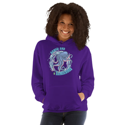 A women standing and wearing a purple graphic hoodie with the graphic of an octopus and the text, Armed and Dangerous by Wizard Prints Shop.