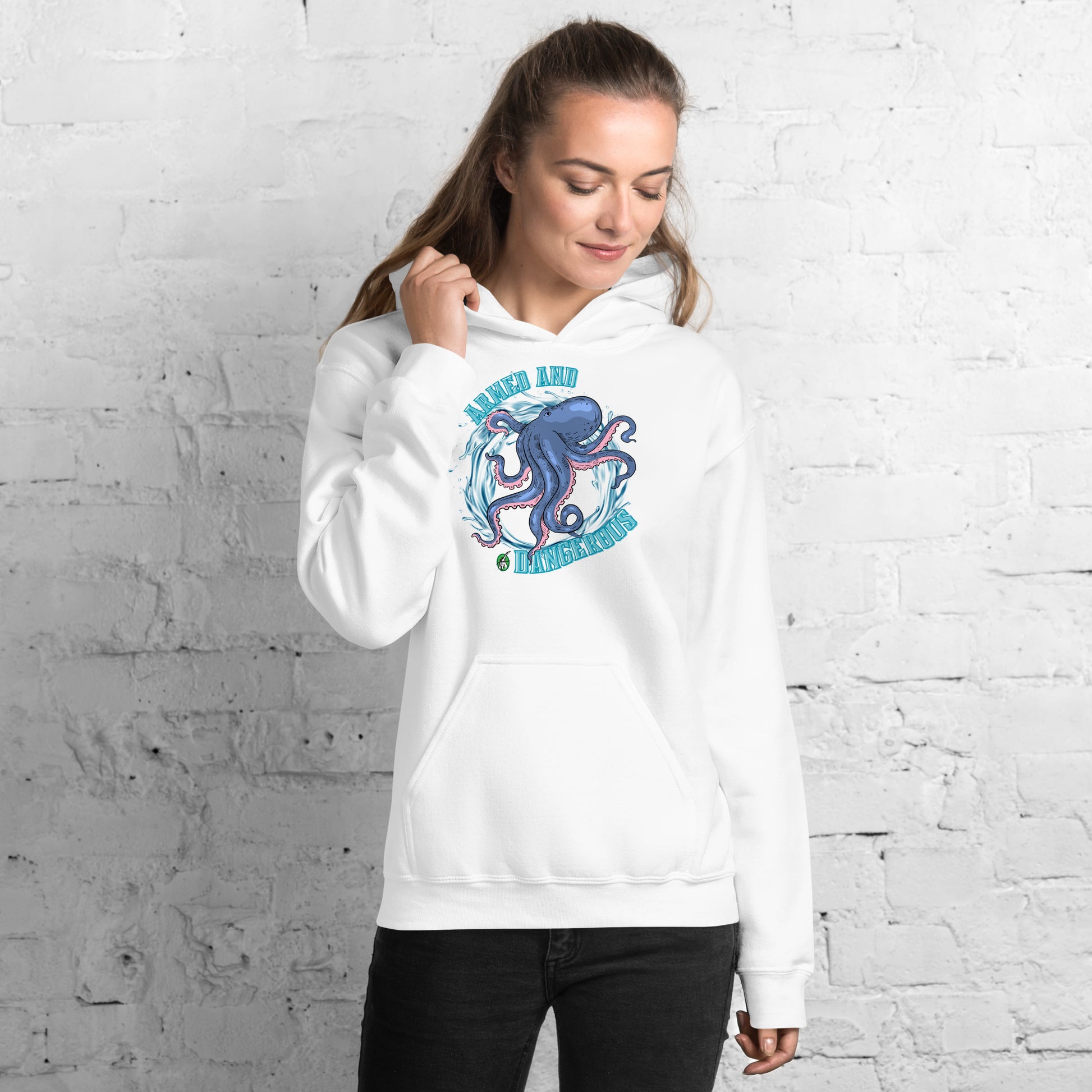 A women standing and wearing a white hoodie with the graphic of an octopus and the text, Armed and Dangerous by Wizard Prints Shop.