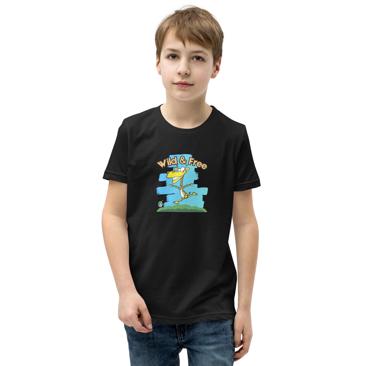 A boy standing wearing a black t-shirt with a funny graphic on the front of a giraffe running with the words, 'wild and free'  by Wizard Prints
