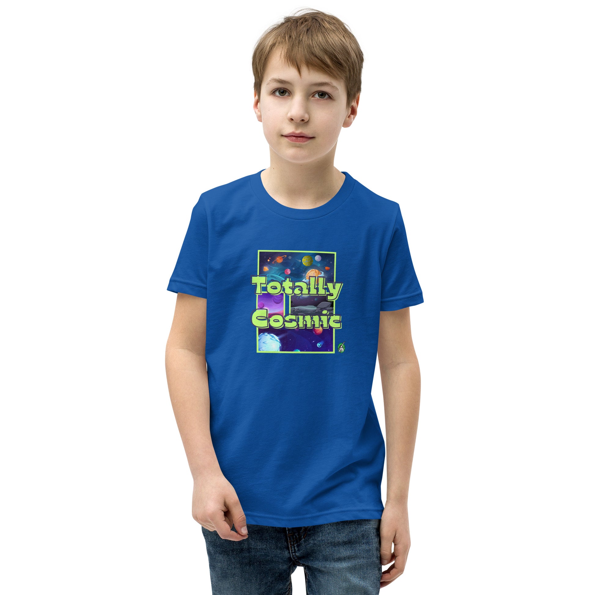 A boy standing wearing a blue kids t-shirt with a graphic of the cosmos and the words Totally Cosmic, by Wizard Prints