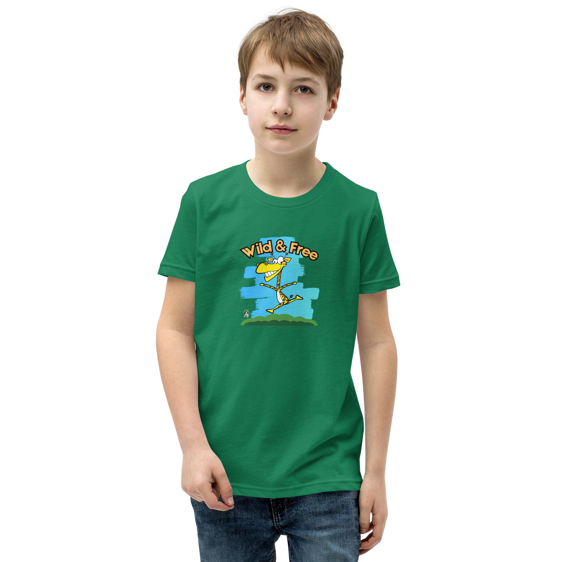 A boy standing wearing a green t-shirt with a funny graphic on the front of a giraffe running with the words, 'wild and free'  by Wizard Prints