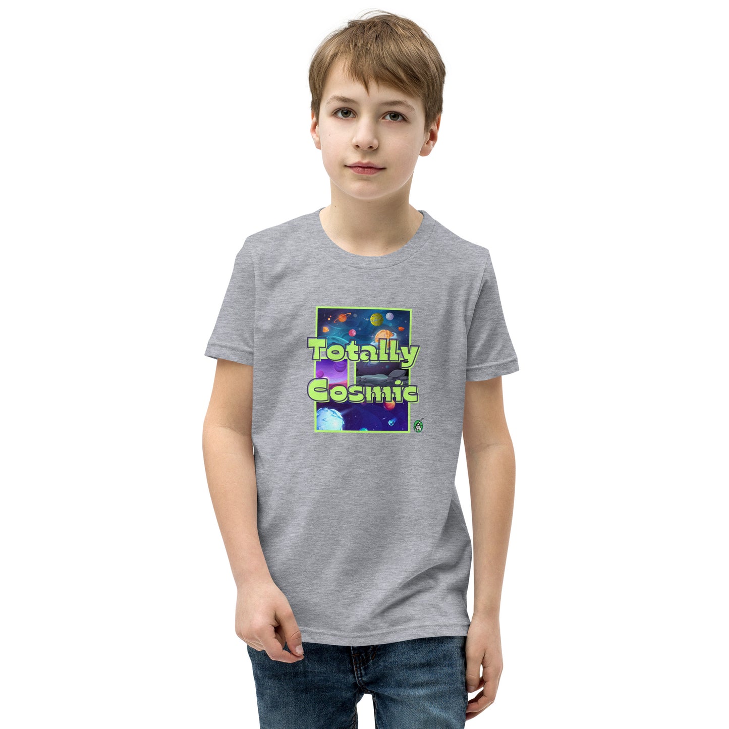 A boy standing wearing a grey kids t-shirt with a graphic of the cosmos and the words Totally Cosmic, by Wizard Prints