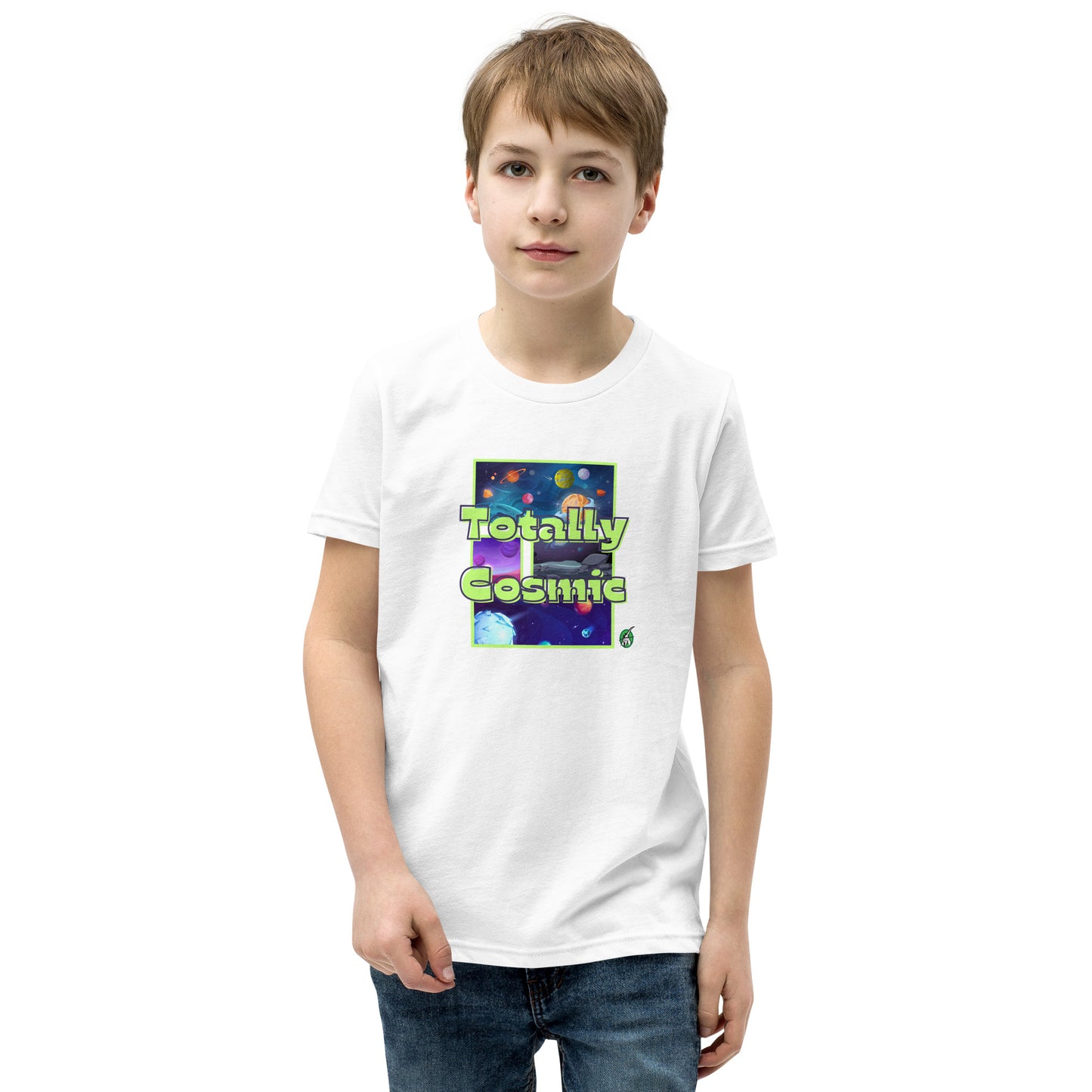 A boy standing wearing a white kids t-shirt with a graphic of the cosmos and the words Totally Cosmic, by Wizard Prints