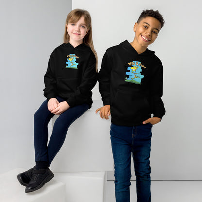 A boy standing and a girl sitting wearing a black hoodie with a funny graphic on the front of a giraffe running with the words, 'wild and free' by Wizard Prints and jeans on a grey background 
