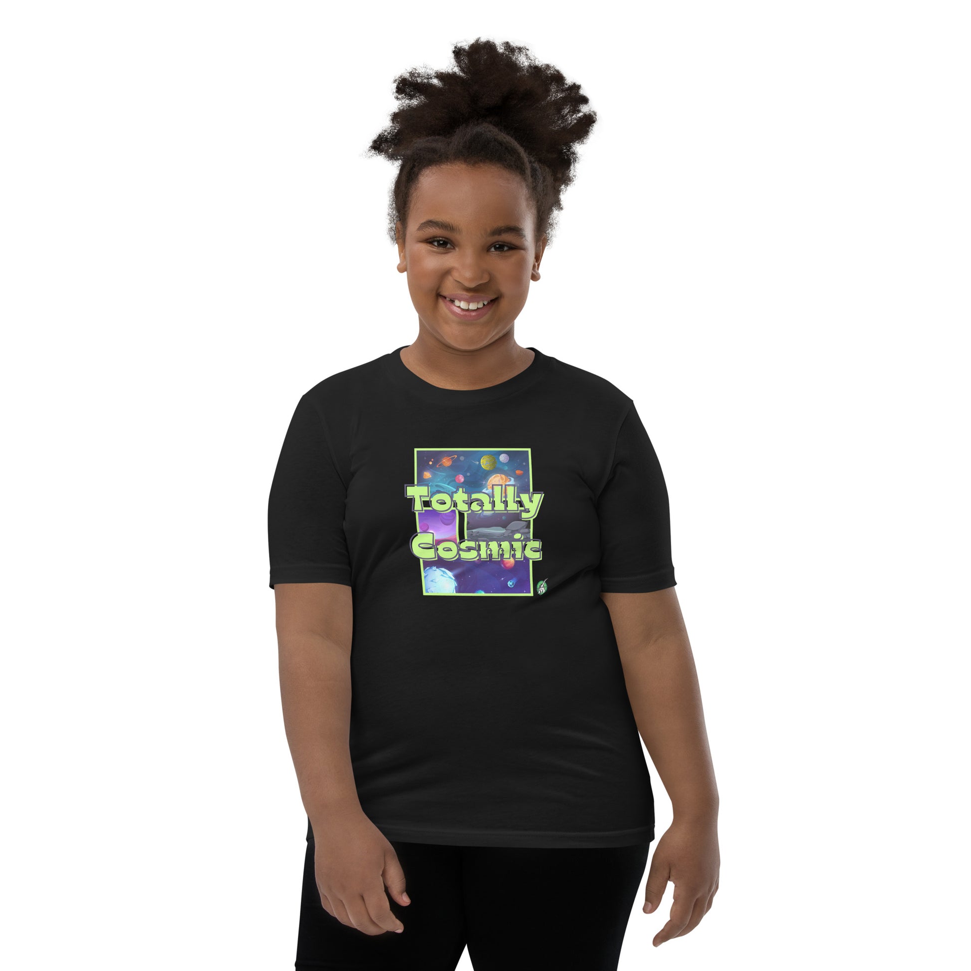 A girl standing wearing a black kids t-shirt with a graphic of the cosmos and the words Totally Cosmic, by Wizard Prints
