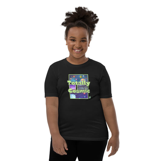 A girl standing wearing a black kids t-shirt with a graphic of the cosmos and the words Totally Cosmic, by Wizard Prints