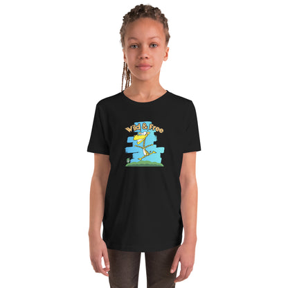 A girl standing wearing a black t-shirt with a funny graphic on the front of a giraffe running with the words, 'wild and free'  by Wizard Prints
