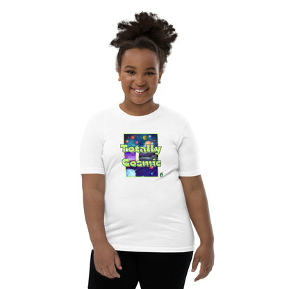 A girl standing wearing a white kids t-shirt with a graphic of the cosmos and the words Totally Cosmic, by Wizard Prints