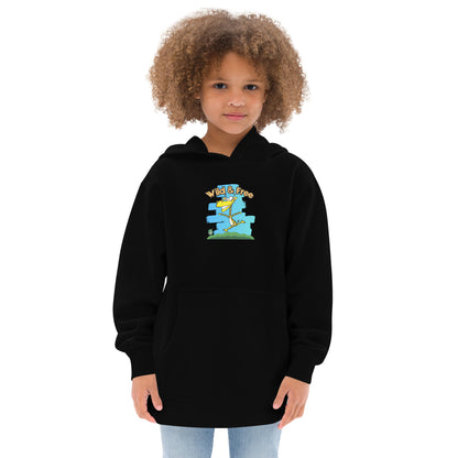 A girl standing wearing a black hoodie with a funny graphic on the front of a giraffe running with the words, 'wild and free'  by Wizard Prints

