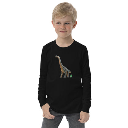 A boy standing and wearing a black long-sleeve T-shirt featuring a printed graphic of life like Brachiosaurus, by Wizard Prints.