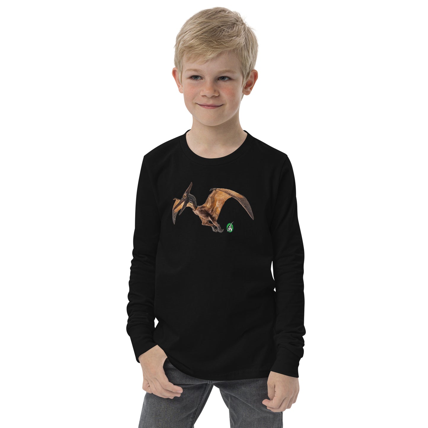 A boy standing and wearing a black long-sleeve T-shirt featuring a printed graphic of a Pterodactyl, by Wizard Prints.