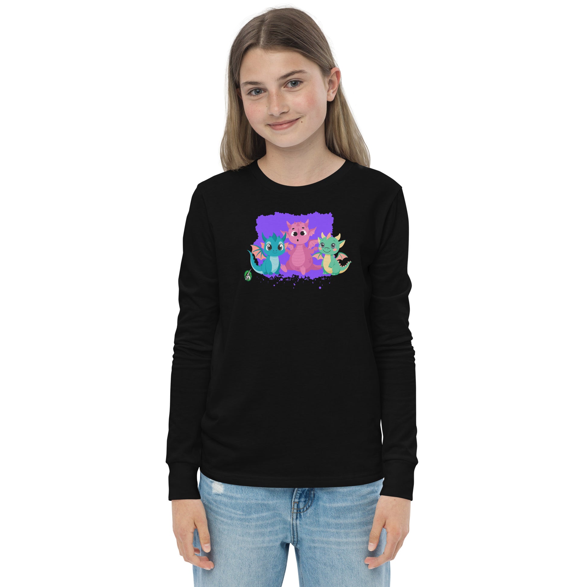 A girl standing and wearing a black long-sleeve T-shirt featuring a printed graphic of colorful dragons, by Wizard Prints.