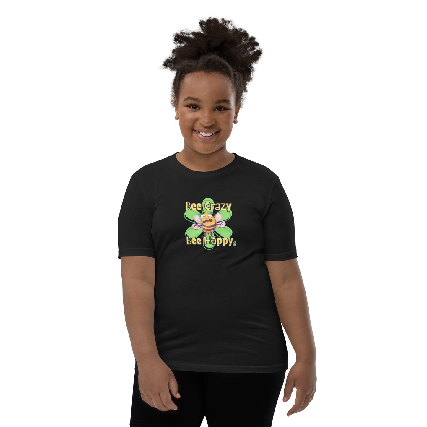  A girl standing wearing a black kids t-shirt with the printed graphic of a crazy bee and the statement, Bee Crazy Bee Happy. Designed by Wizard Prints