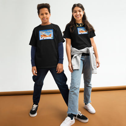 A boy and girl standing and wearing black t-shirts featuring a printed graphic of a vintage airplane and the words, Flying High. Designed by Wizards Prints.