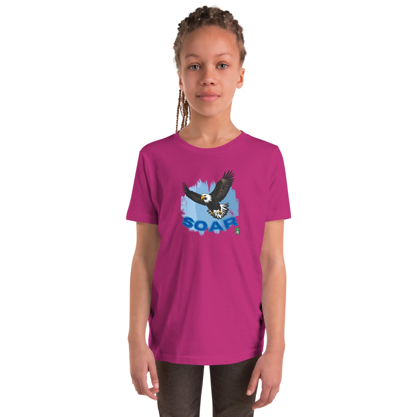 A girl wearing a Wizard Prints kids t-shirt in berry colour with a printed graphic on the front of an eagle soaring in the sky.