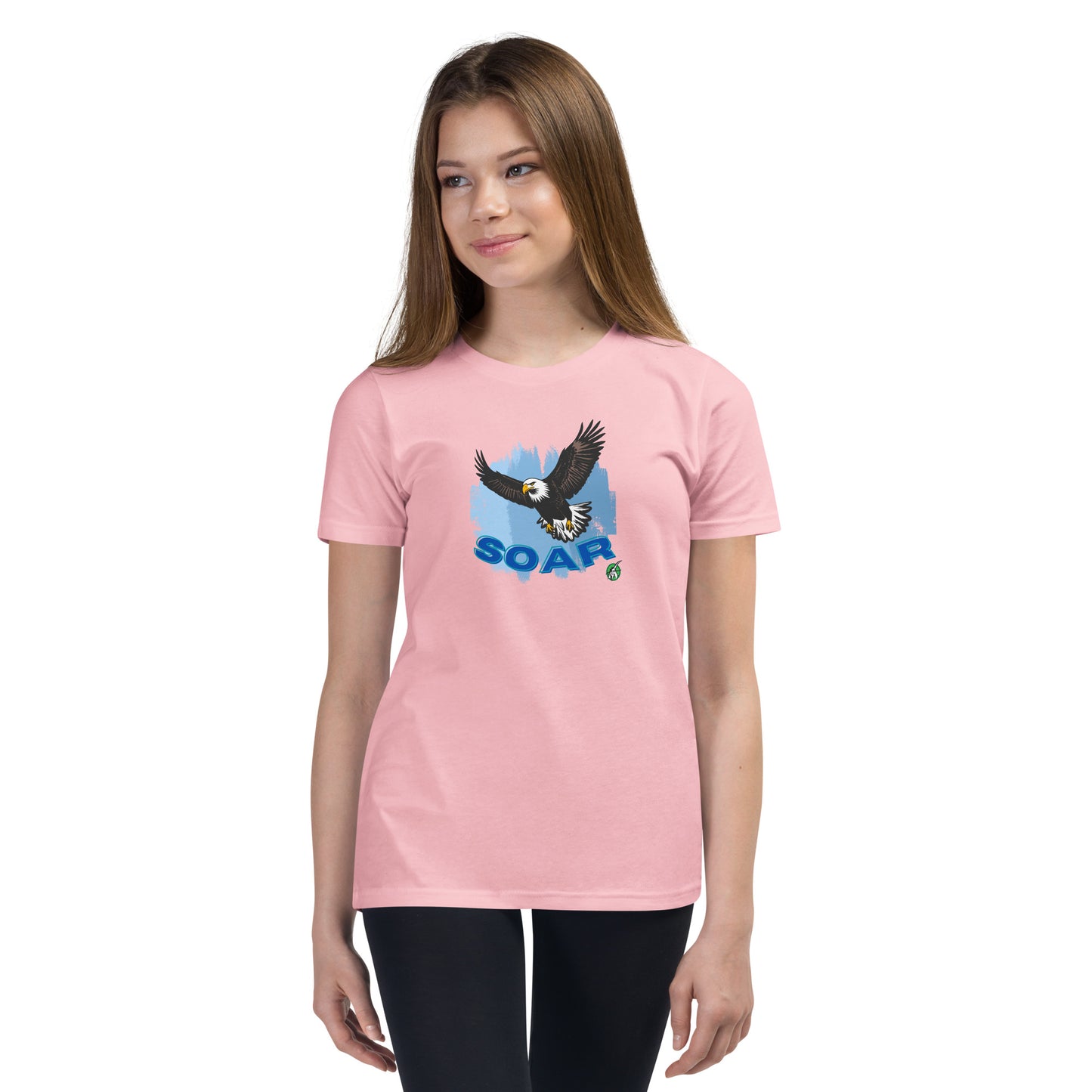 A girl wearing a Wizard Prints kids t-shirt in pink with a printed graphic on the front of an eagle soaring in the sky.