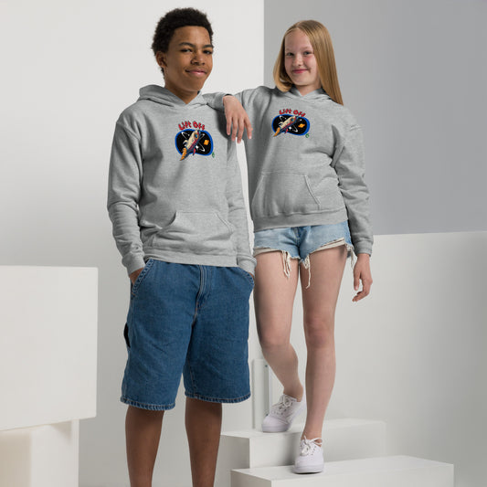 A boy and girl wearing a Wizard Prints kids hoodie in grey with a printed graphic on the front of a spaceship with the words, Lift Off
