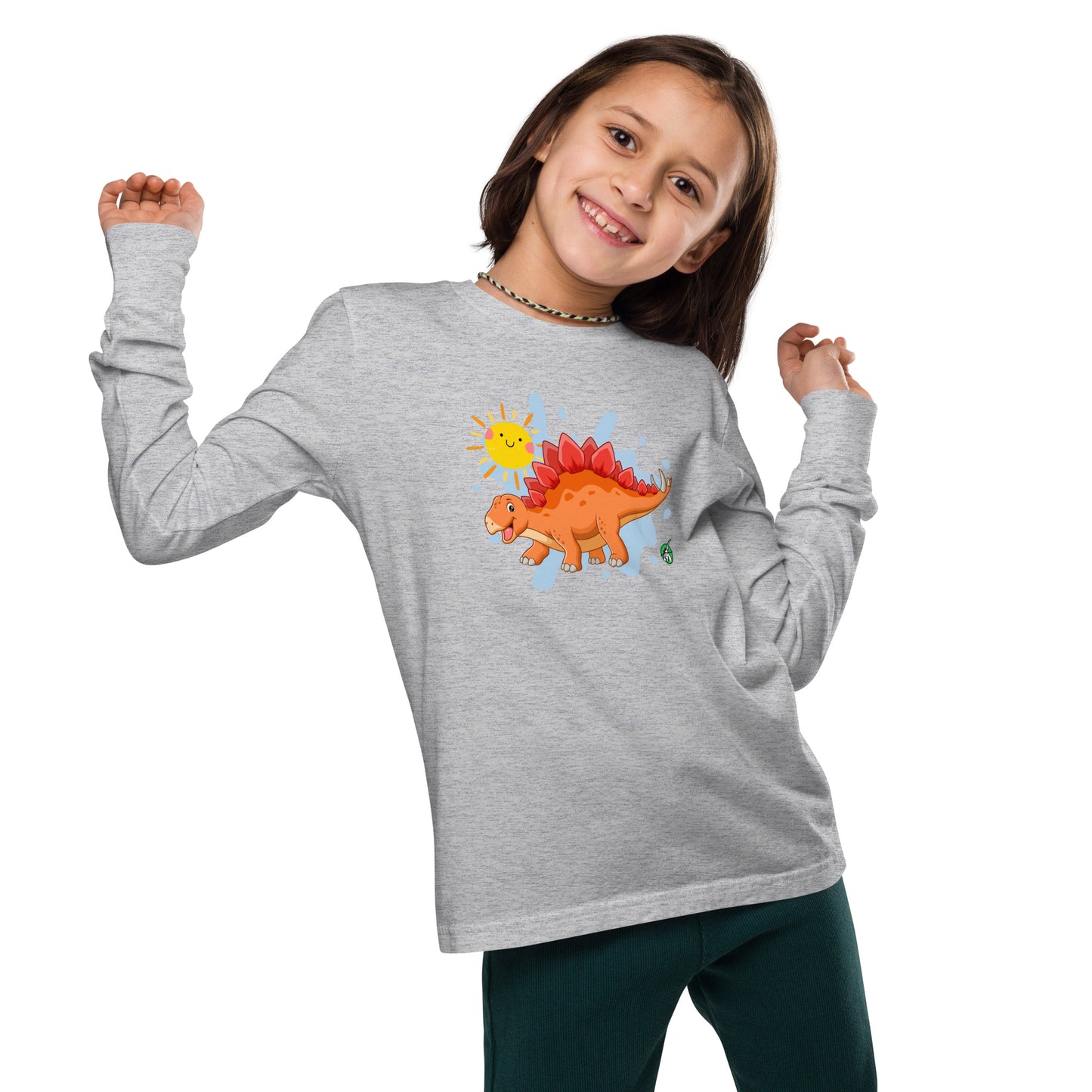 A girl standing and wearing a grey long sleeve t-shirt with a printed graphic of an orange dinosaur and the sun, by Wizard Prints.