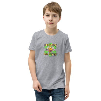  A boy standing wearing a grey kids t-shirt with the printed graphic of a crazy bee and the statement, Bee Crazy Bee Happy. Designed by Wizard Prints