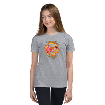  A girl standing wearing a grey kids t-shirt with the printed graphic of a fire-breathing dragon with the statement, Unleash the Dragon. Designed by Wizard Prints