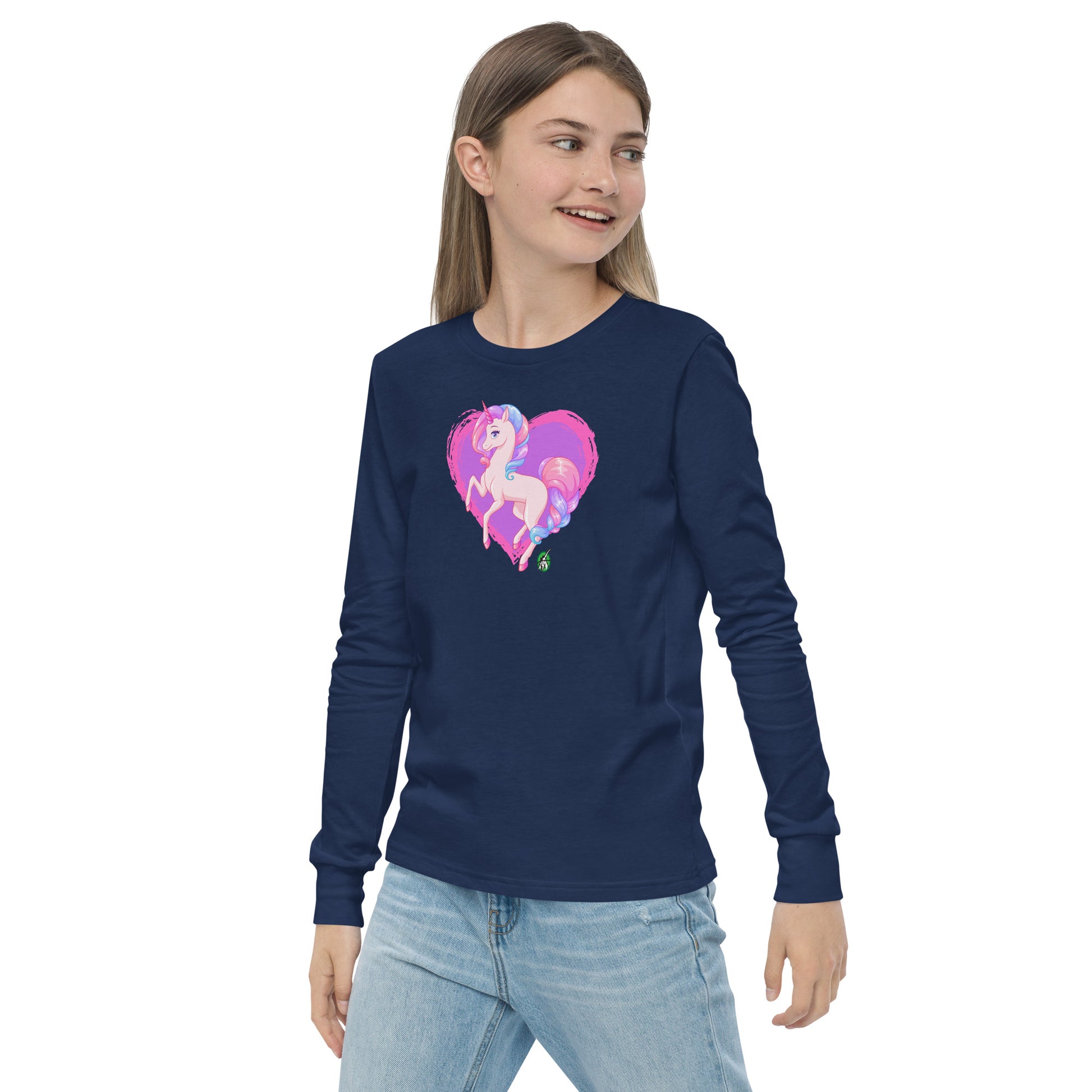 A girl standing and wearing a navy blue long-sleeve T-shirt featuring a printed graphic of a pink unicorn on a purple heart background, by Wizard Prints.