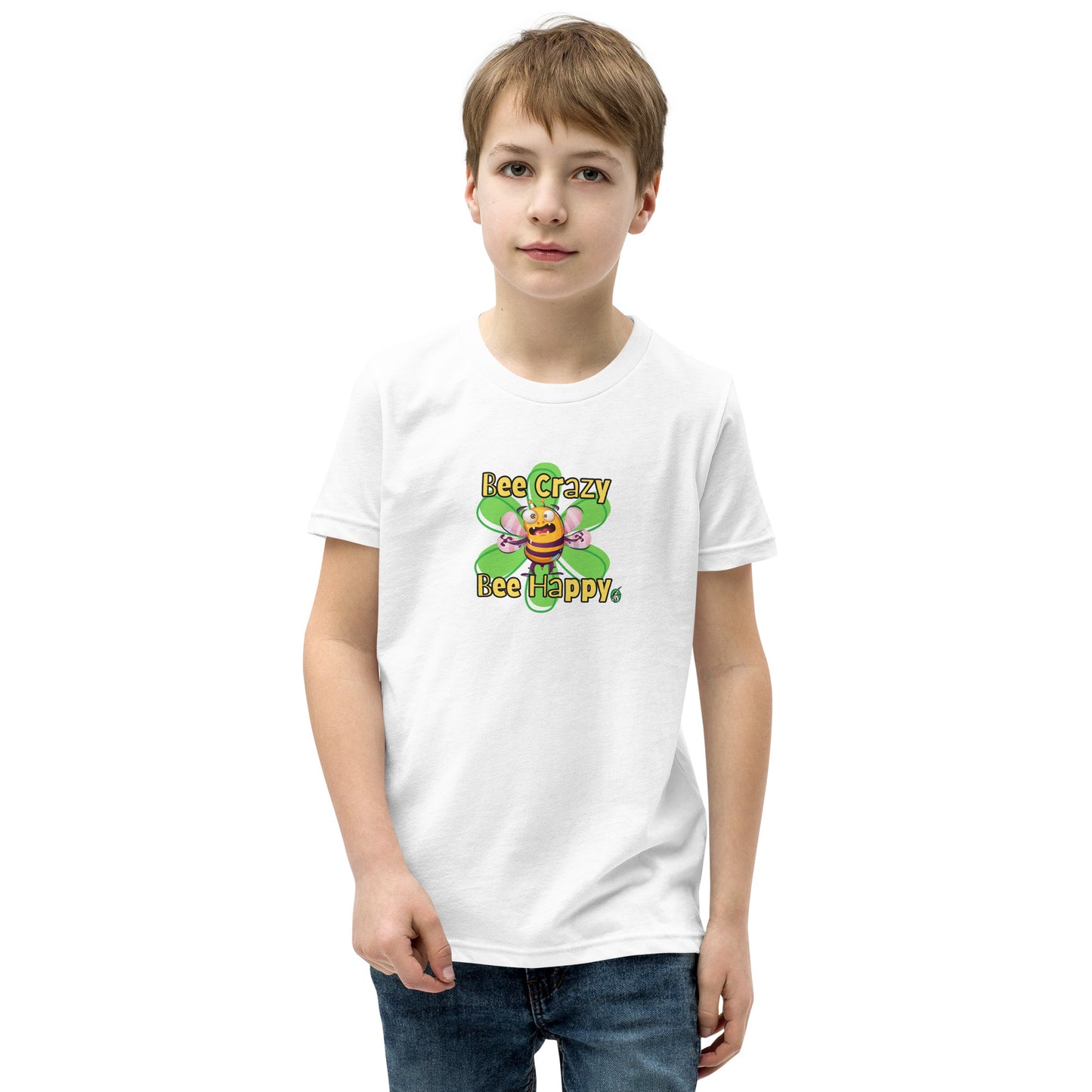  A boy standing wearing a white kids t-shirt with the printed graphic of a crazy bee and the statement, Bee Crazy Bee Happy. Designed by Wizard Prints