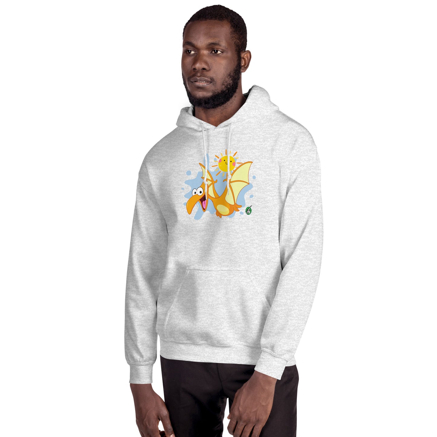 A man standing wearing an ash hoodie with a printed graphic of a smiling cartoon dinosaur and the sun. Designed by Wizard Prints.