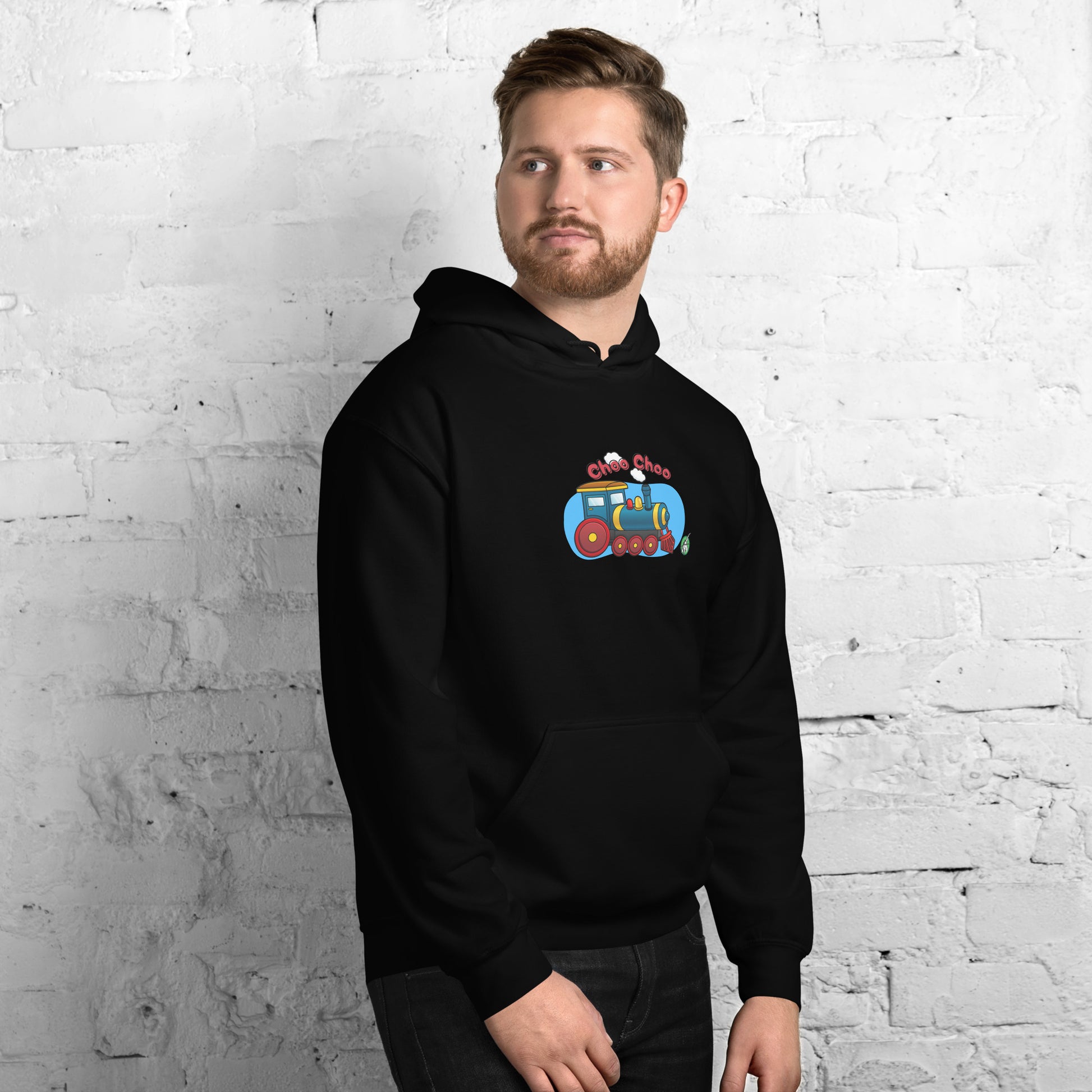 A man standing wearing a black hoodie with a printed graphic of a cartoon train and the words 'Choo Choo'. Designed by Wizard Prints