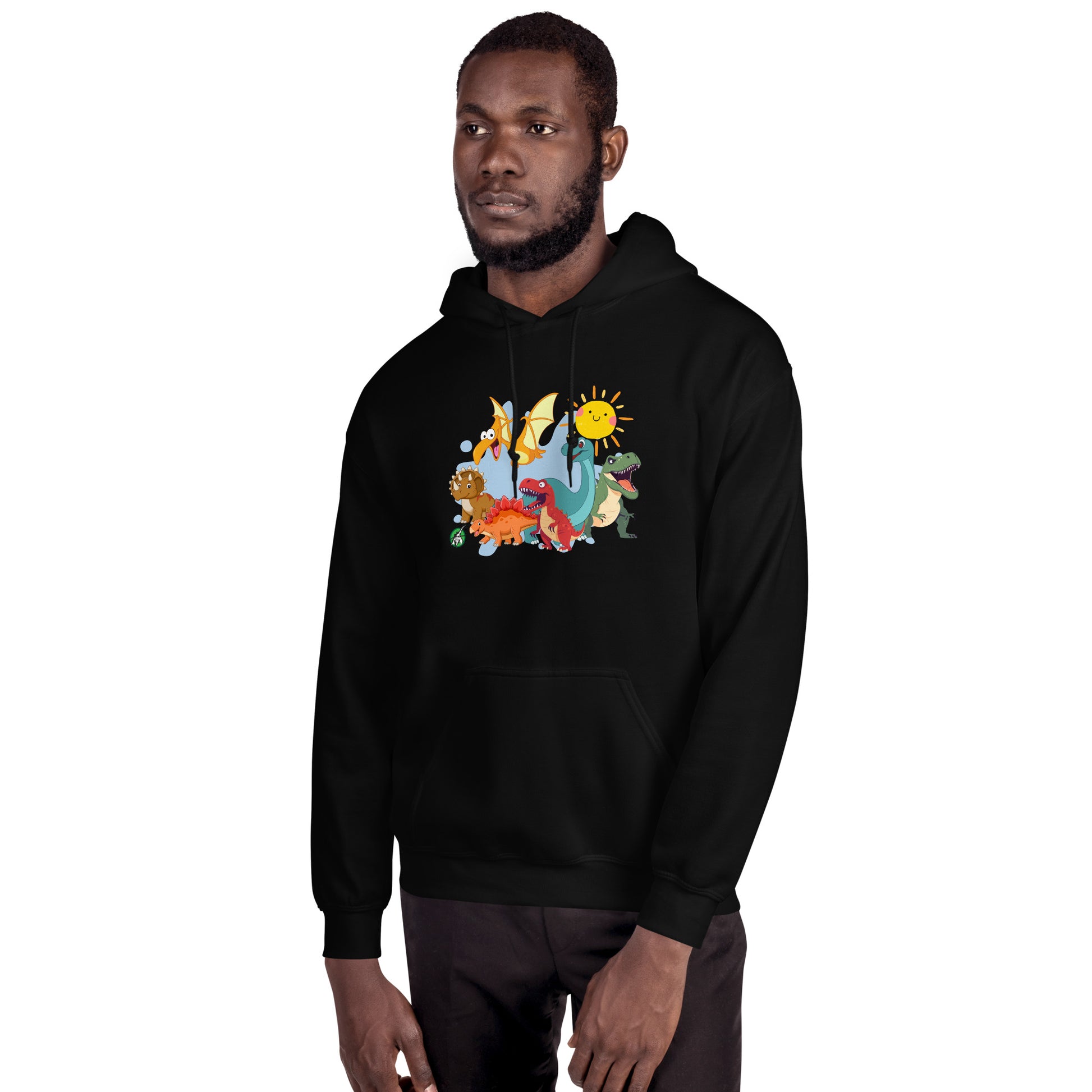 A man standing wearing a black hoodie with a printed graphic of different colorful dinosaur types and the sun. Designed by Wizard Prints.