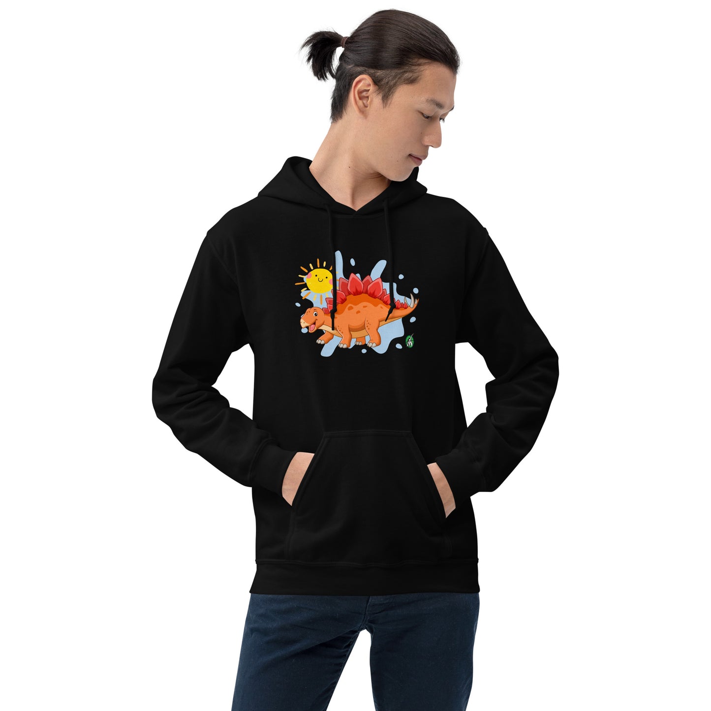 A man standing wearing a black hoodie with the printed graphic of an orange cartoon dinosaur and the sun, by Wizard Prints.