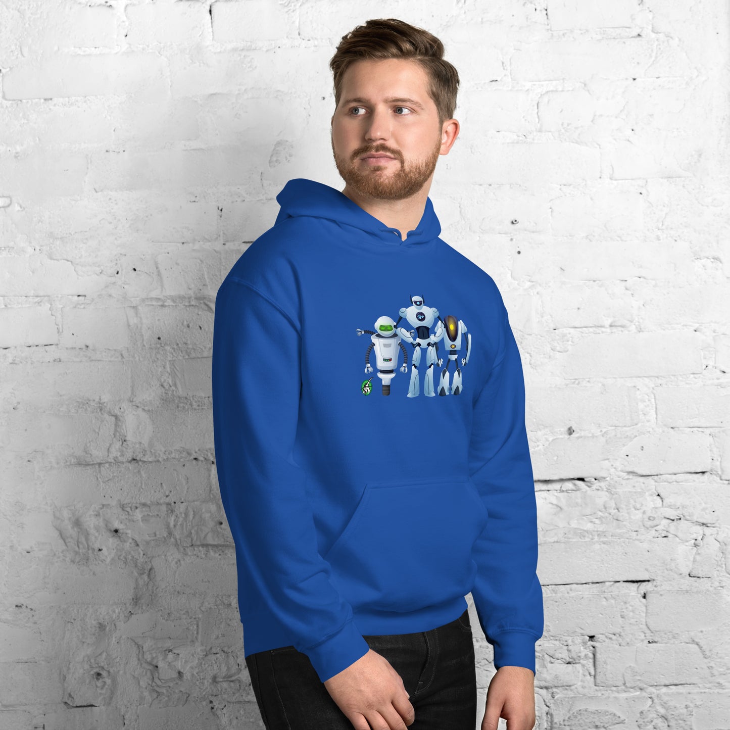 A man standing wearing a blue hoodie with a printed graphic of three cartoon robots, designed by Wizard Prints