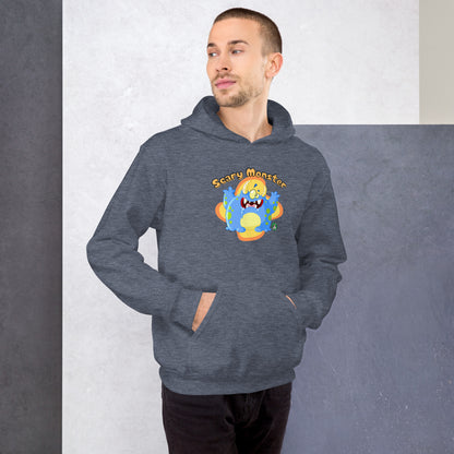 A man standing wearing a dark grey hoodie with a printed graphic of a cartoon monster and the words, Scary Monster. Designed by Wizard Prints.