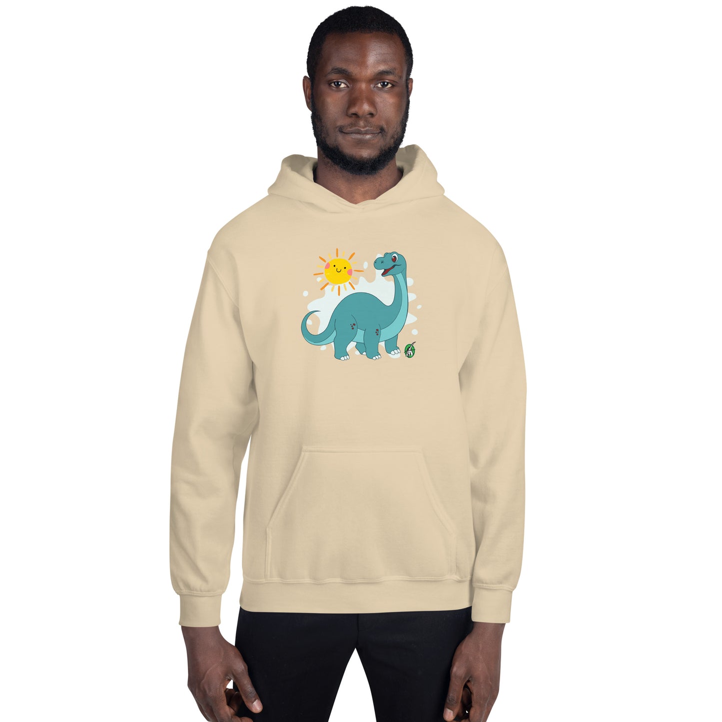 A man standing wearing a beige hoodie with a printed graphic of a smiling cartoon dinosaur and the sun. Designed by Wizard Prints.
