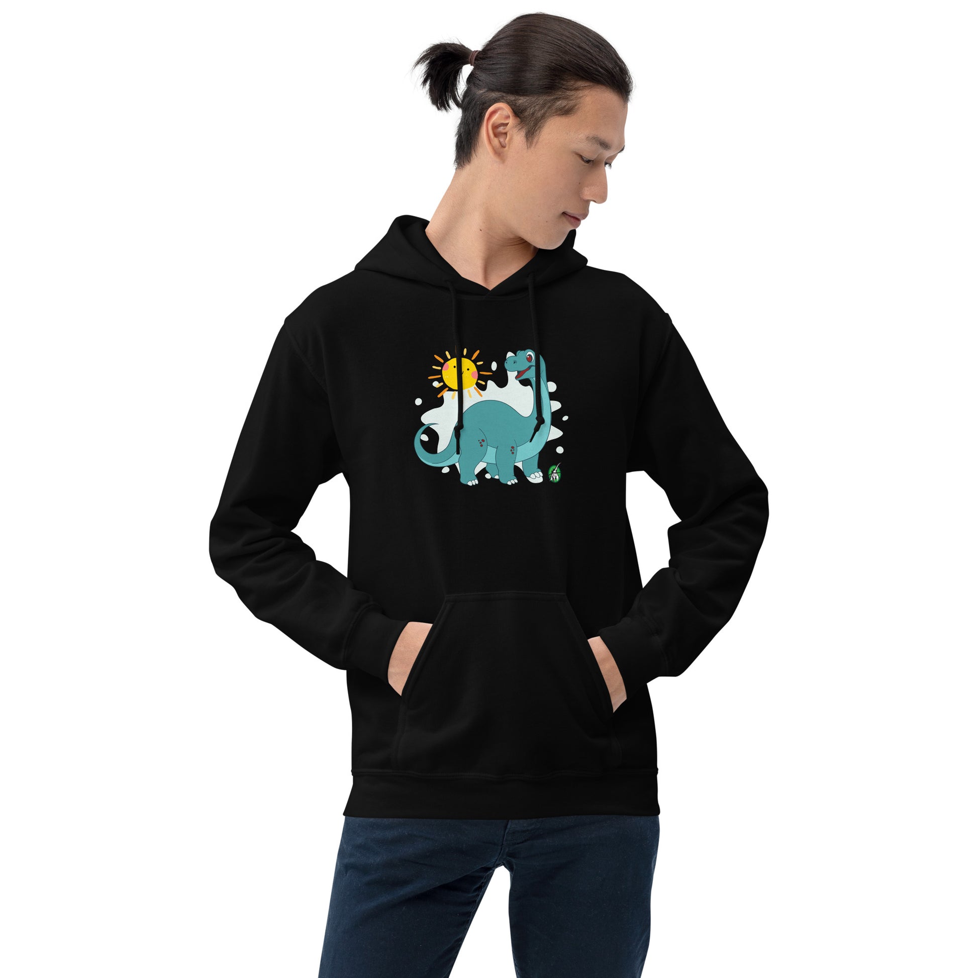 A man standing wearing a black hoodie with a printed graphic of a smiling cartoon dinosaur and the sun. Designed by Wizard Prints.