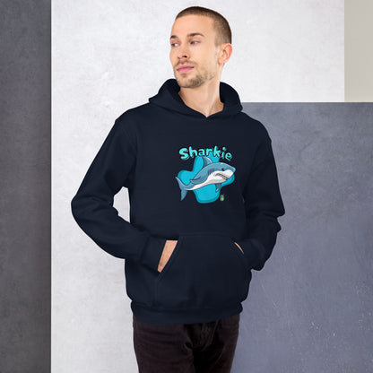 A man standing wearing a navy blue hoodie with a printed graphic of a cartoon shark and the word, Sharkie. Designed by Wizard Prints.